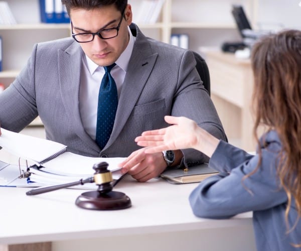 Lawyer discussing the legal case with a client